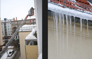 Firemen clearing the lethal icicles hanging from rooftops. - <em> by SL Wong</em>
